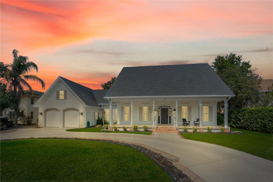 Located on the highly sought-after Sugar Mill Country Club golf course with stunning panoramic views, this beautifully renovated five-bedroom home offers true turnkey living with premium upgrades throughout. Every detail has been thoughtfully redesigned, including a brand-new chef’s kitchen, updated living and family rooms, and a spacious first-floor primary suite. A second bedroom on the main level is ideal for a home office or can easily be converted into an in-law suite. Fresh interior and exterior paint and high-end finishes create a bright, modern Florida lifestyle.

The family room showcases a custom whiskey and wine bar with sink and fridge perfect for entertaining, while the expansive upstairs bonus room with custom built-ins provides flexible space for a media room, office, or guest retreat. Major mechanical updates include new HVAC systems installed in 2024, and a new gas water heater in 2025 providing efficiency and peace of mind.

The outdoor spaces have been completely transformed with all-new custom landscaping, a gas fire pit, outdoor gas hookup for a grill, new irrigation with a well, an oversized expansive paver patio, a covered screened sunroom, and a welcoming covered front porch designed for year-round indoor-outdoor living. Enjoy sweeping views of the first hole of Sugar Mill CC and the convenience of being just a short walk to the clubhouse and community amenities, including the pool, gym, tennis, and pickleball.

Additional highlights include a side-entry two-car garage plus dedicated golf-cart space, a Generac 22kW whole-home natural gas generator, and approximately 400 square feet of attic storage above the garage.

This must see move-in-ready one of a kind custom home combines luxury, location, and lifestyle in one of New Smyrna Beach’s most desirable golf communities.

Owner is a licensed real estate agent.