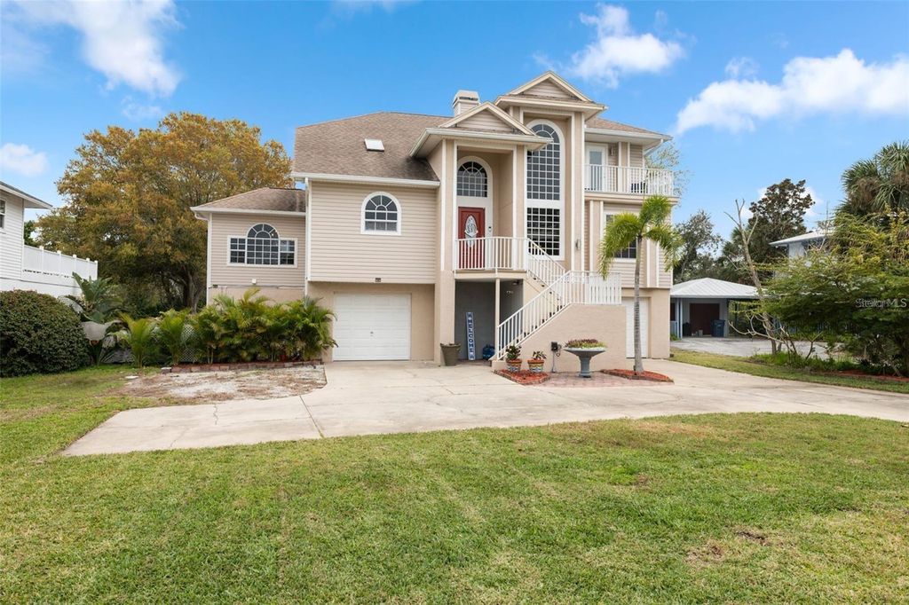 Photo of 3114 Bluff Boulevard, Holiday, FL 34691 (MLS # TB8486712)