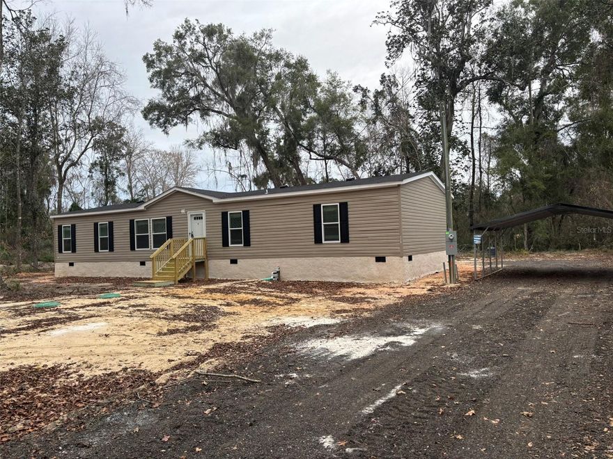 One or more photo(s) has been virtually staged. Under Construction. Your new family friendly home is almost ready. Quiet peaceful setting in a great neighborhood. This modern new home will be ready by the first week of February. All that is left are final inspections, clean up and some landscaping. The power should be on in the next few weeks for viewings and walkthroughs. Chiefland, Fl is a charming little town full of fun activities and beautiful sights. Whether you enjoy the outdoors, local history, or tasty food, Chiefland has it all! You can take a break from everyday life and enjoy the peaceful atmosphere while making unforgettable memories. Local attractions include 1. Manatee Springs State Park 2. Levy County Quilt Museum 3. Bike or Hike the Nature Coast State Trail 4. Chiefland Golf and Country Club (The 18-hole golf course provides a challenging yet enjoyable game for players of all skill levels. The lush greens and scenic landscaping make it a pleasurable place to play). 5. Stargaze at the Chiefland Astronomy Park 6. Watch a Show at the Chief Theatre 7. Take a Scenic Drive on the Nature Coast 8.Canoe or Kayak Key at Fanning Springs State Park. 9. Relax at the Suwannee River State Park. 10. Go tubing down the Ichetucknee River 11. Head over to Cedar Key or Steinhatchee to go saltwater fishing and eat some fantastic seafood. You're going to love this home and the area. Great schools also.