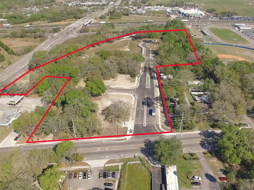Under Construction. Mango Pointe Commercial Subdivision - 10 Individual sites for sale 36 to 2.58 acre sites.  Approved (PD) Planned Development allows for Hotel, Retail, Restaurant and Office for 87,650 sqft. SE corner Interstate 4/CR 579, High visibility on Interstate 4. Access from Mango Road (CR 579) and the main grand entrance U.S. Highway 92. Access to county water and sewer. Master retention and commercial community.  Area of heavy growth along I-4 corridor of residential and commercial. Last remaining undeveloped site on intersection. PD updated in 2015. Adjacent to Armwood High School, across from Lazydays RV, Country Inn & Suites, Cracker Barrel, Wendy's, Bob Evans Restaurant, Hampton Inn, Gator Ford, Rooms to Go, minutes from I-75 and Hard Rock Casino, State Fair grounds, minutes from Tampa International Airport and downtown Tampa.