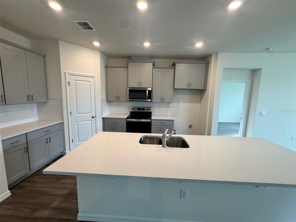 Photo of 3013 Kingsman Trail, Ormond Beach, FL 32174 (MLS # O6386343)