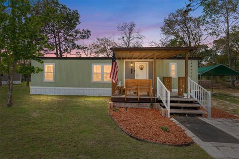 Photo of 12310 SE 86th Avenue, Belleview, FL 34420 (MLS # OM720954)