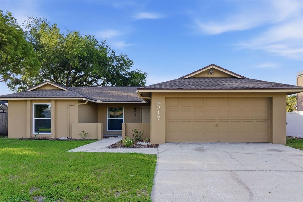 Photo of 4017 Braesgate Lane, Tampa, FL 33624 (MLS # TB8497754)