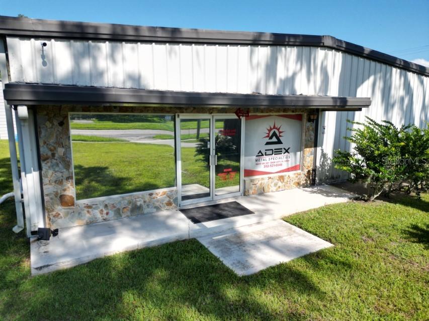 Turn-Key CNC Metal Fabrication Shop – Fully Equipped – Zoned C2 - Dade City, FL. Rare opportunity to own a fully operational, turn-key CNC metal fabrication shop located on high-visibility US Hwy 301, just south of SR 50 in northern Dade City. This rural property offers exceptional access along a major Florida highway while providing space, privacy, and everything needed to hit the ground running. The 5,000 sq. ft. structural steel building sits on just over half an acre, with a concrete slab foundation and an insulated metal roof designed for year-round efficiency and durability. The facility includes three 12’x10’ commercial-grade roll-up doors, a mounted vehicle lift located under an 18’x30’x14’ metal carport, a private 24’x12’ office, a waiting room, and a full bathroom. For ease of operation, there’s also a 14’x11’ loading dock with a circle drive, along with ample customer parking and heavy-duty power capacity to support industrial operations. A propane forklift is included, along with a large inventory of raw materials such as stainless steel, aluminum, iron, sheet metal, pipe, and angle stock. The shop comes fully equipped with essential fabrication and welding equipment, including TIG, MIG, and Stick welders, a CNC plasma cutting table, and cutting torches with tanks, hoses, and accessories. Additional tools include a drill press, lathe, metal punches, reamers, taps, benders, and cutters—plus hundreds of bits, chucks, dies, and specialty tools. All on-site equipment, tools, and supplies convey with the sale, making this a true turn-key opportunity. The property is fully operational and ready for immediate use, making it ideal for an owner-operator, a custom fabrication or CNC machining business, light manufacturing, or a business looking to expand in the growing Central Florida market. Don’t miss this chance to acquire a profitable, income-producing commercial property with built-in infrastructure, a strong location, and everything in place to support continued growth and success. Spectrum & TECO utility providers. Well and Septic mean low utility costs. A cross-over median on Hwy 301 in front of the subject allows for easy access for deliveries and North or South bound traffic departures.