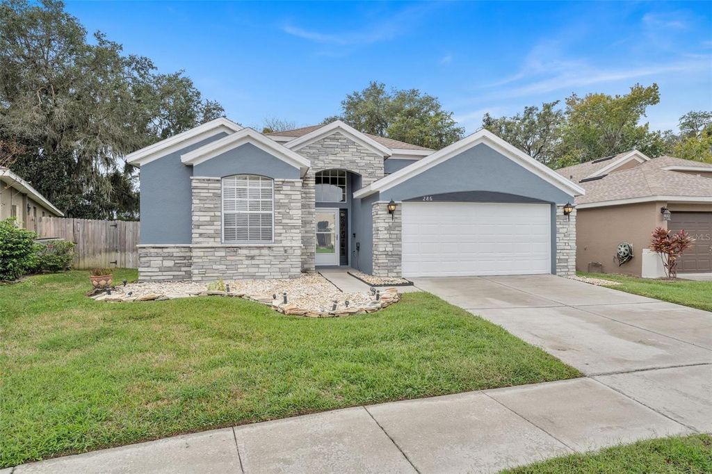 Photo of 286 Tavestock Loop, Winter Springs, FL 32708 (MLS # O6364563)