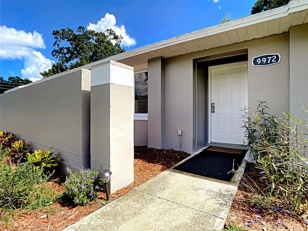 Photo of 9972 Burl Way, Orlando, FL 32817 (MLS # O6344370)