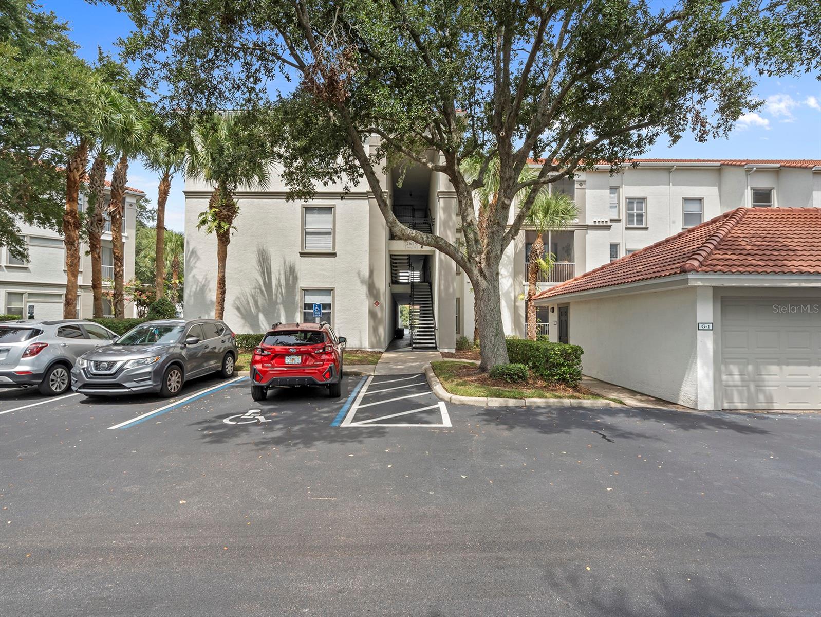Wow! Beautifully remodeled! RARE one car garage! Luxury vinyl plank flooring throughout the home! Water views! Split bedrooms! Resort style amenities, including pool, Clubhouse, fitness Center , tennis court, playground, Walking path around pond, and a car wash area. Terrific location with easy access to everything Central Florida has to offer