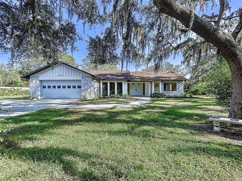 Photo of 6602 Winding Brook Drive, New Port Richey, FL 34655 (MLS # TB8391237)