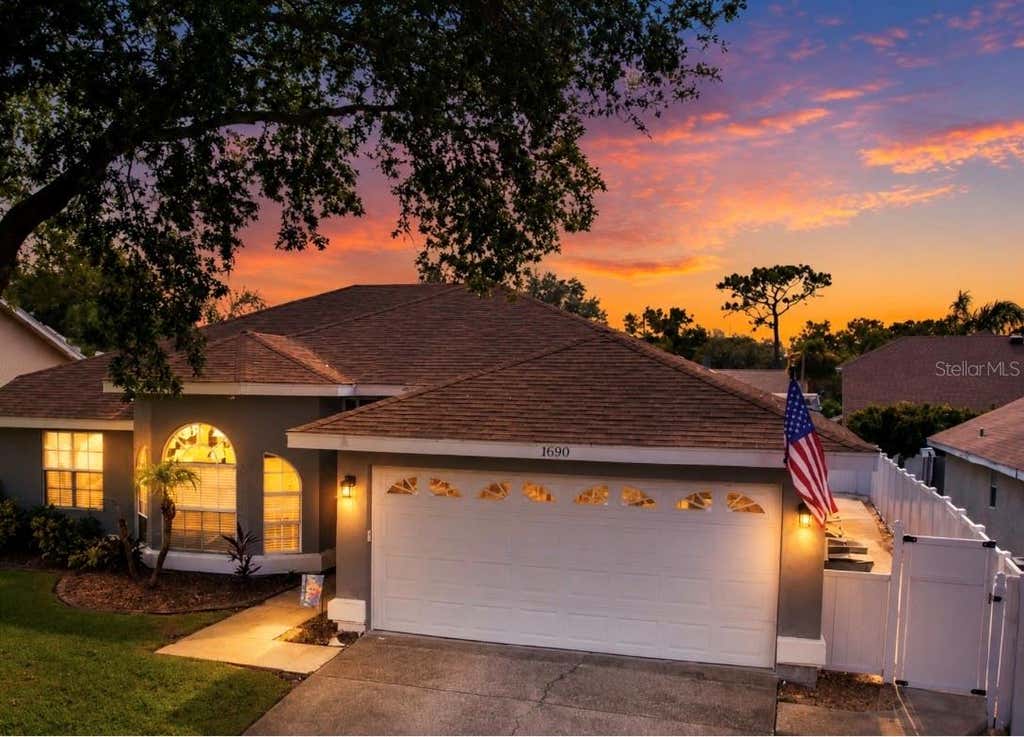 Photo of 1690 Winners Circle, Tarpon Springs, FL 34689 (MLS # TB8532230)
