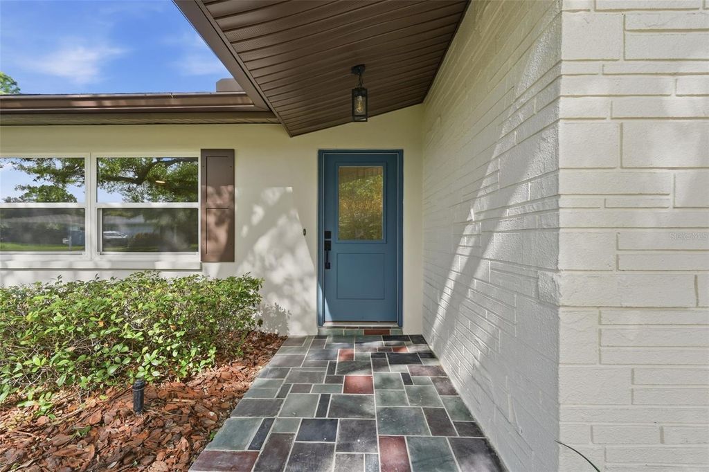 Photo of 2150 Sarazen Drive, Dunedin, FL 34698 (MLS # TB8495849)
