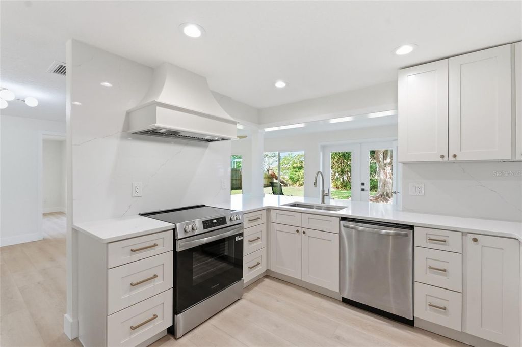 Photo of 2150 Sarazen Drive, Dunedin, FL 34698 (MLS # TB8495849)