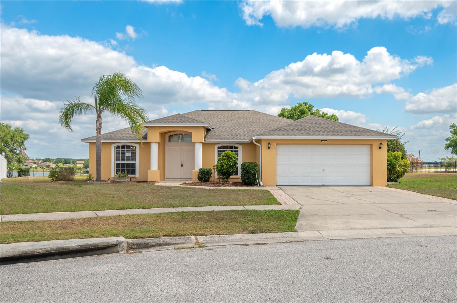 Welcome to this well-maintained 4-bedroom, 2-bath single-family home located in the desirable Savanna Pointe community. This move-in ready home features spacious bedrooms, a nice-sized living room, a spacious kitchen, and a 2-car garage. Step out back and relax in the covered lanai, perfect for enjoying Florida evenings. Conveniently located just minutes from Legoland, the Chain of Lakes, shopping, dining, and major highways. Make this home today!