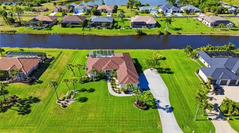 Photo of 1132 Boundary Boulevard, Rotonda West, FL 33947 (MLS # D6146670)