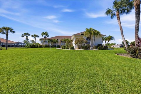 Photo of 1132 Boundary Boulevard, Rotonda West, FL 33947 (MLS # D6146670)