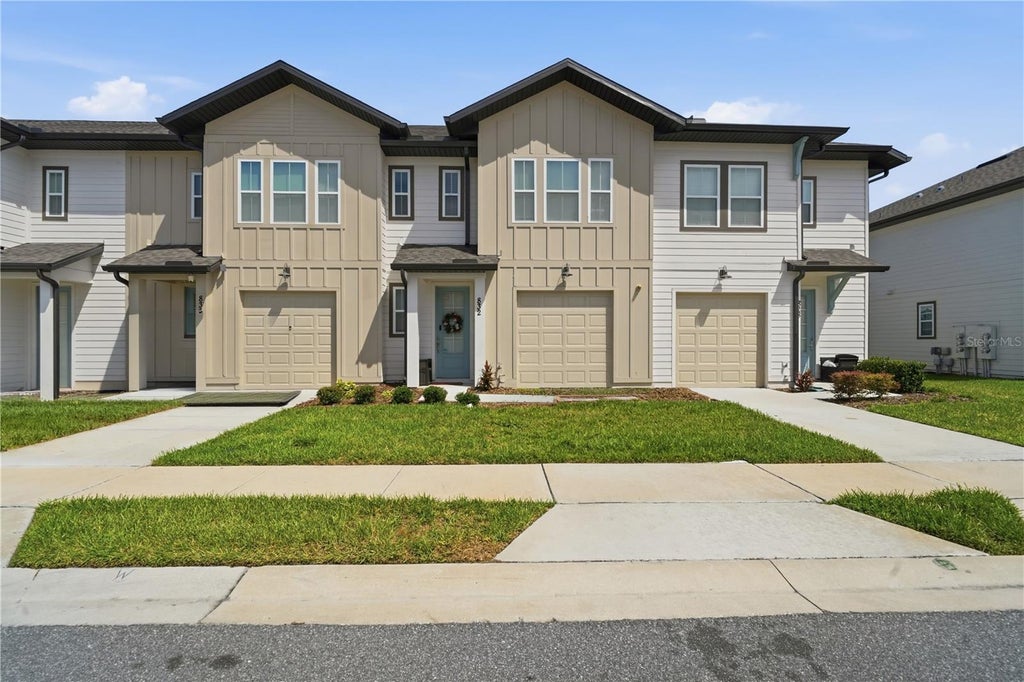 Photo of 832 Longboat Drive, Davenport, FL 33896 (MLS # S5152067)