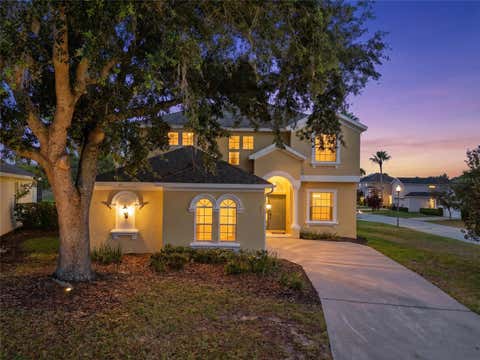 Photo of 353 Plumoso Loop, Davenport, FL 33897 (MLS # O6407247)