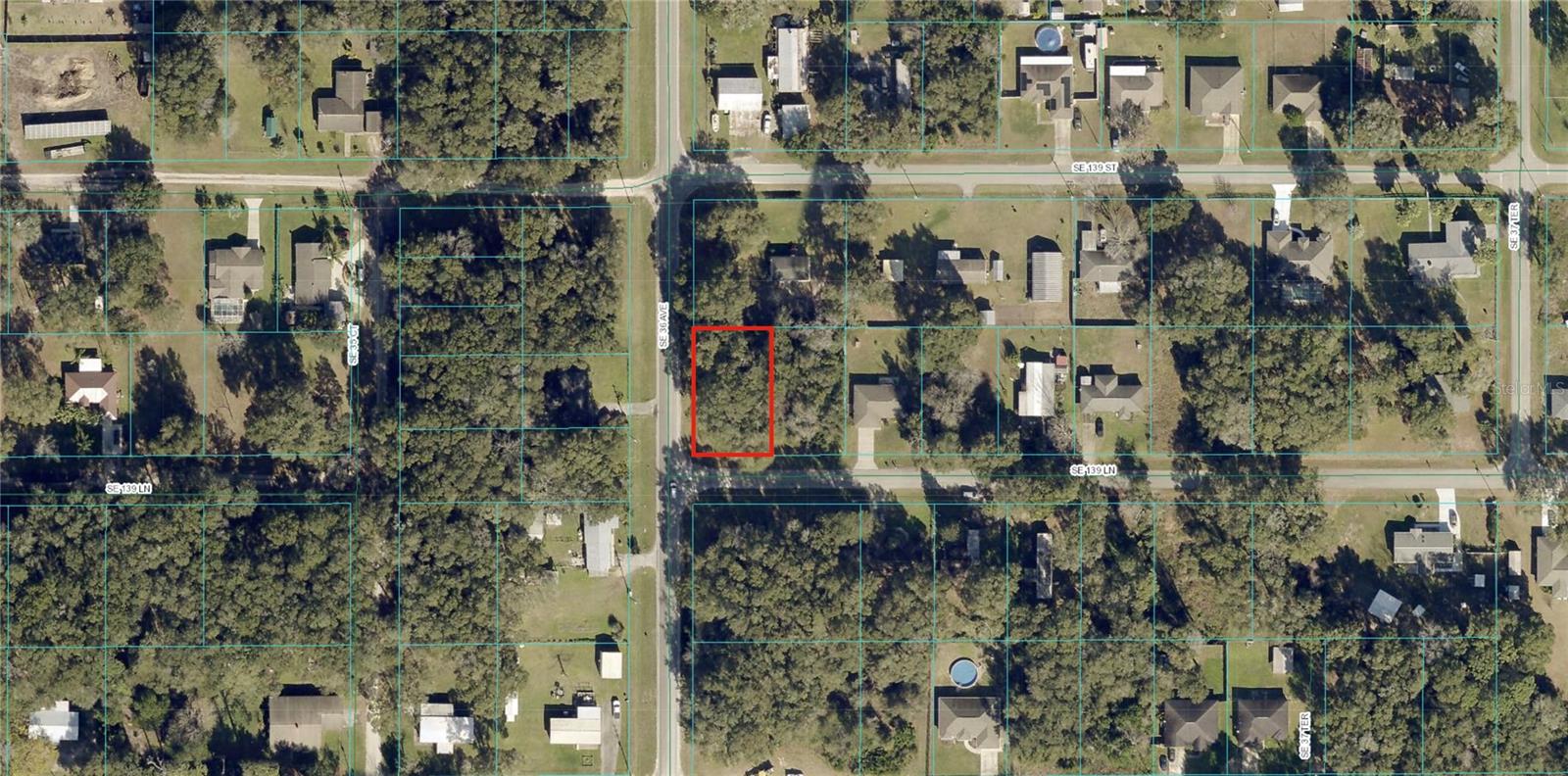 Huge corner lot directly on the PAVED road. Hurry to grab this 0.29 acre lot (12,600 Square Feet). This part of Summerfield has lots of nice homes and new construction happening, including a brand new house across the street from this lot. NO flood zone to worry about, NO HOA, and a new environmental survey has just been done showing no issues with the property. This lot in Marion County parcel 4211-128-001. The street address was created only for mapping/driving directions, and is not an official street address. For driving directions, you may also copy and paste these GPS Coordinates in Apple or Google Maps: 29.018309, -82.086543 Perfect location if you want to be away from it all but still close everything. Minutes from The Villages, Ocala, and Belleview for restaurants, work, and entertainment. Around 30 minutes from the World Equestrian Center. Surrounded by plenty of boating, fishing and other water-based activities, with many nearby boat ramps and access to Lake Weir. Also, only an hour away from the Gulf of Mexico with many great white sand beaches. Prices continue to rise here, get in now! Seller has other unlisted lots in the same area that are available.