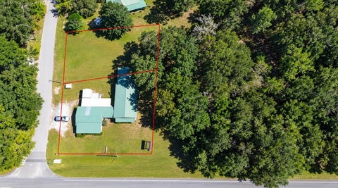Photo of 7103 N Carl G Rose Highway, Hernando, FL 34442 (MLS # OM718666)