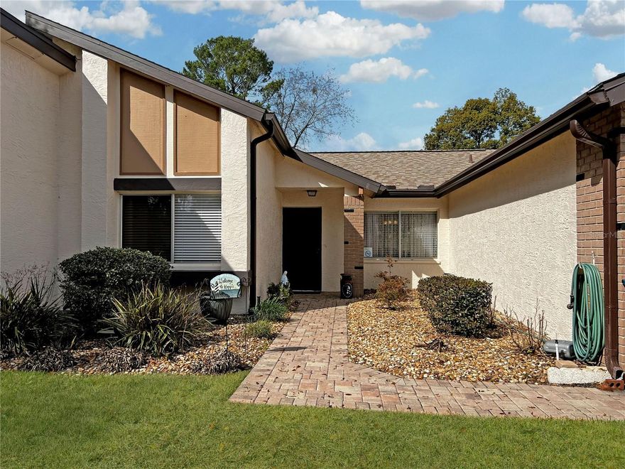 Welcome to easy Florida living in the sought-after golf community of the The Heather.  This charming 2 bedroom, 2 bathroom, 1 car garage villa offers comfort, convenience, and a location that feels like a permanent vacation.  Step inside and you walk right into the dinning room and living room area.  Just off the dinning room is the spacious guest bedroom complete with a walk-in closet. The guest bathroom is just outside of the bedroom and features tile flooring, a tub-shower combination, and a newer vanity for a fresh, clean feel.  The primary suite is designed for easy living, offering multiple closets for all your storage needs, plus a built-in linen closet just outside the en-suite bath. The primary bathroom includes a walk-in shower for everyday convenience.  The family room is bright and inviting, overlooking the peaceful backyard where you can enjoy watching birds and nature. It’s the perfect space to unwind or entertain guests.  The kitchen features classic shaker cabinets and a pantry for added storage, blending function with timeless style. The washer and dryer are located in the well-kept garage, keeping the interior living space organized and efficient.  Location is everything, and this villa delivers: Just 2 miles from Weeki Wachee Springs State Park, 9 miles to Pine Island Beach, and 10 miles to the Hernando Beach Public Boat Ramp.  The community offers lots of social activities at their clubhouse as well.  With restaurants, shopping, golf, and outdoor recreation all nearby, this home offers the ideal blend of relaxation and accessibility.  Whether you’re searching for a seasonal retreat, downsizing opportunity, or low-maintenance primary residence, this villa is a wonderful place to call home.  Sellers willing to pay first two months of HOA dues.