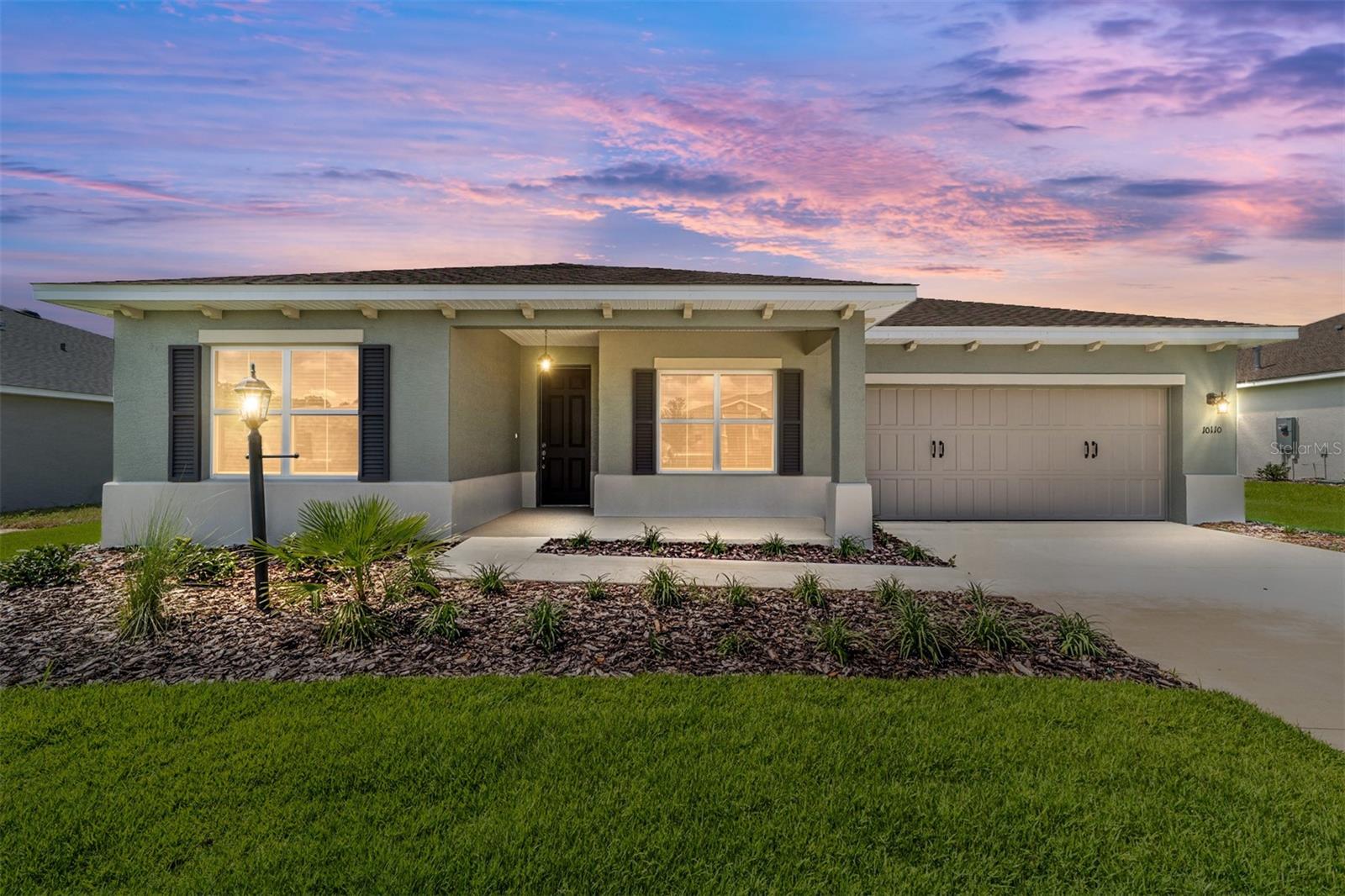 Discover the Ariana Model, a stunning new construction home in LongLeaf Ridge at On Top of the World, Ocala’s premier 55+ active adult community. Thoughtfully designed for both style and comfort, this home offers 2 bedrooms, 2 bathrooms, a versatile flex room, luxury vinyl plank flooring, and a spacious 2+ car garage. The gourmet kitchen is a showstopper, featuring a built-in oven and microwave, 5-burner cooktop, quartz countertops, elegant backsplash, and under-cabinet lighting. Premium white staggered cabinetry with crown molding elevates the space while providing ample storage, complemented by a walk-in pantry and an oversized island—perfect for both entertaining and everyday living. At the front of the home, the flex room with French doors makes an ideal office or hobby space. The guest bedroom enjoys abundant natural light and a large closet, with an adjacent full bath featuring a quartz vanity and a tile shower/tub combination. The primary suite is a private retreat with a large three-panel window, generous walk-in closet, and spa-inspired en suite complete with a double vanity sink with quartz counters, a zero-entry tiled shower with built-in bench and glass enclosure, and a linen closet. Step outside to the screened lanai, where you can enjoy Florida living year-round. Nestled in a gated, golf cart-friendly community with world-class amenities and direct access to shopping and dining, this home perfectly balances luxury and convenience. Don’t miss your chance to own this elegantly finished, move-in ready home—schedule your private showing today!