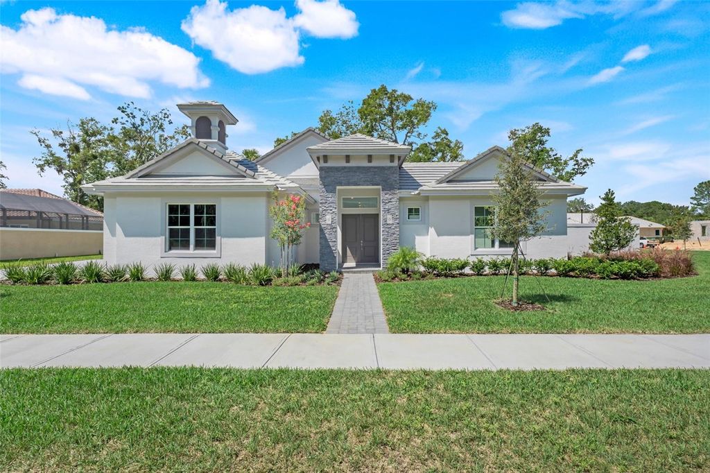 Photo of 110 New Leatherwood Drive, Palm Coast, FL 32137 (MLS # O6352011)