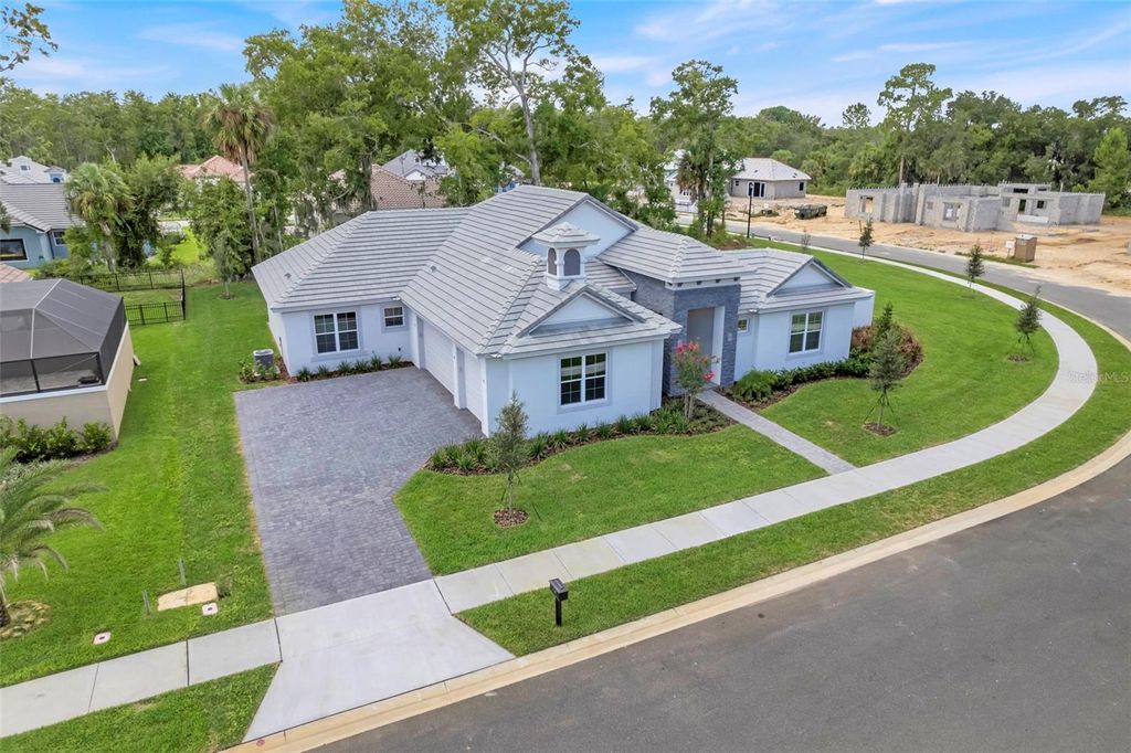 Photo of 110 New Leatherwood Drive, Palm Coast, FL 32137 (MLS # O6352011)