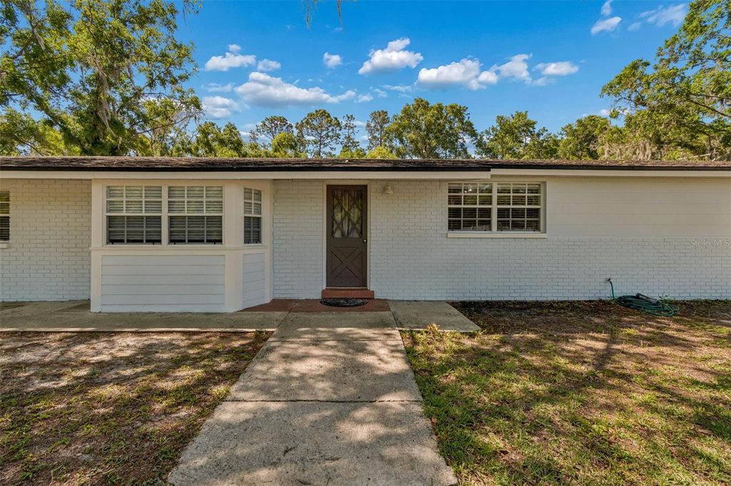 Photo of 608 Krazy Lane, Lutz, FL 33548 (MLS # TB8495909)