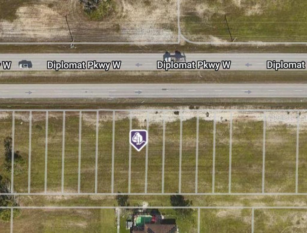 Photo of 348 Diplomat Parkway W, Cape Coral, FL 33993 (MLS # C7504113)