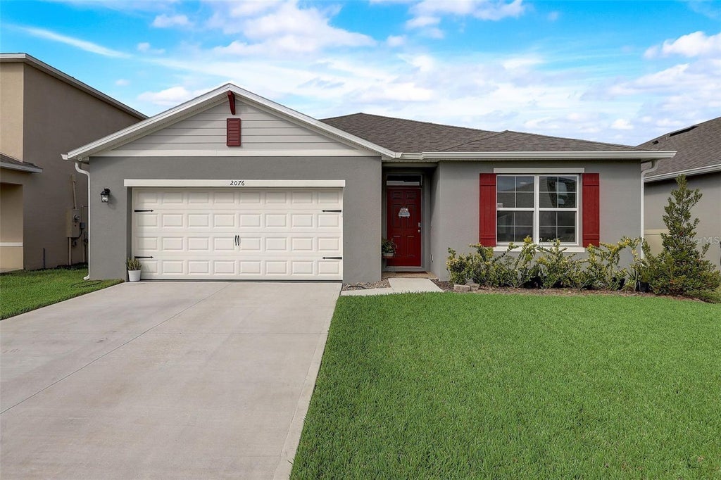 Photo of 2076 Tay Wes Dr, Saint Cloud, FL 34771 (MLS # S5160030)