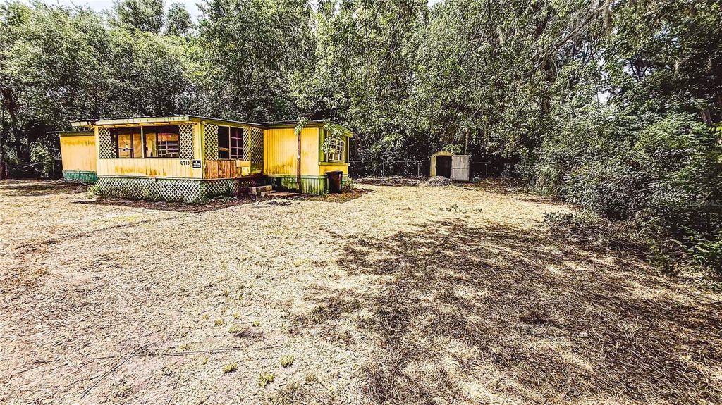 Photo of 6713 SW 54th Avenue, Gainesville, FL 32608 (MLS # GC539723)