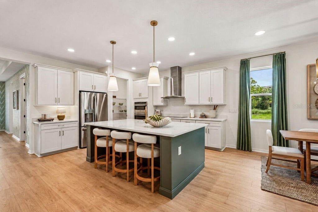 Photo of 24520 SW Kingsway Circle, Lake Suzy, FL 34269 (MLS # R4912226)