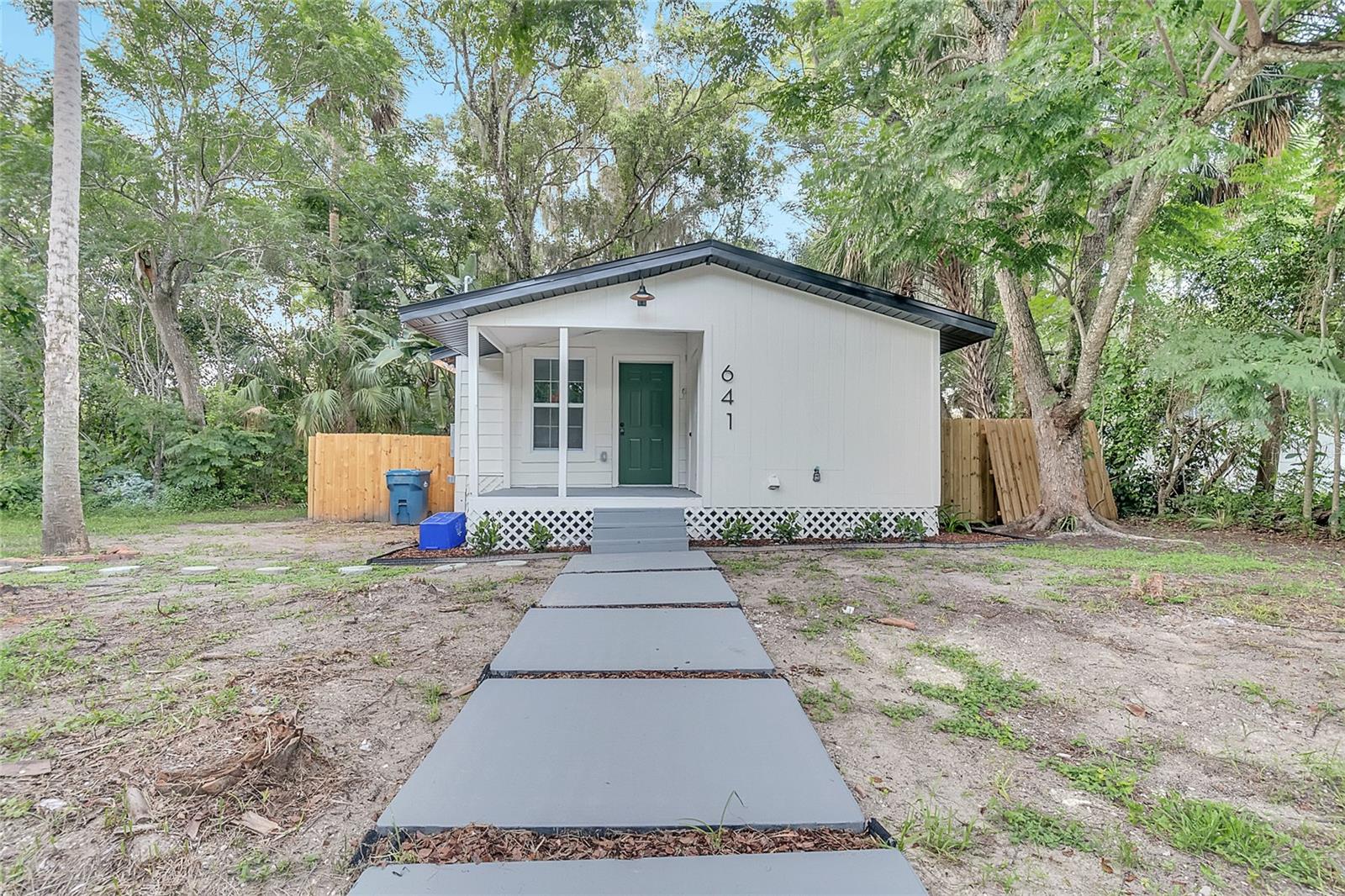 Welcome to 641 W Beresford Rd in DeLand—fully renovated and move-in ready! This charming 2-bedroom, 1-bath home sits on a rare 0.49-acre lot just minutes from downtown and surrounded by Florida’s most beautiful springs. Enjoy peace of mind with a brand-new roof, HVAC, and electrical panel—all completed in 2025 with permits. Inside, the open-concept layout features 875 sq ft of updated living space, including new flooring, baseboards, doors, cabinets, fixtures, and fresh paint inside and out. Located just 5 minutes from De Leon Springs State Park and a short drive to Blue Spring and Green Springs, this property offers both comfort and convenience on nearly half an acre. Don’t miss this unique opportunity to own a beautifully updated home on an oversized lot in a prime DeLand location
