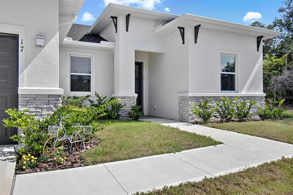 Photo of 17 Ferngate Lane, Palm Coast, FL 32137 (MLS # FC319641)