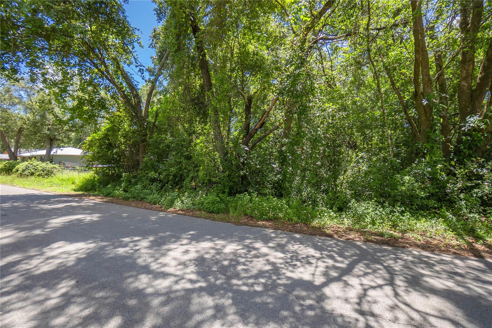 Looking for a little patch of Florida to call your own? This wooded .22 acre lot might just be your next great adventure. It’s got trees, it’s got a paved road, and it’s just waiting for someone with a vision (and maybe a toolbox). Tucked in a quiet part of Inverness but close enough to town for coffee runs and supply grabs, this lot is perfect for your future getaway, homestead, or that “someday” build you keep talking about.