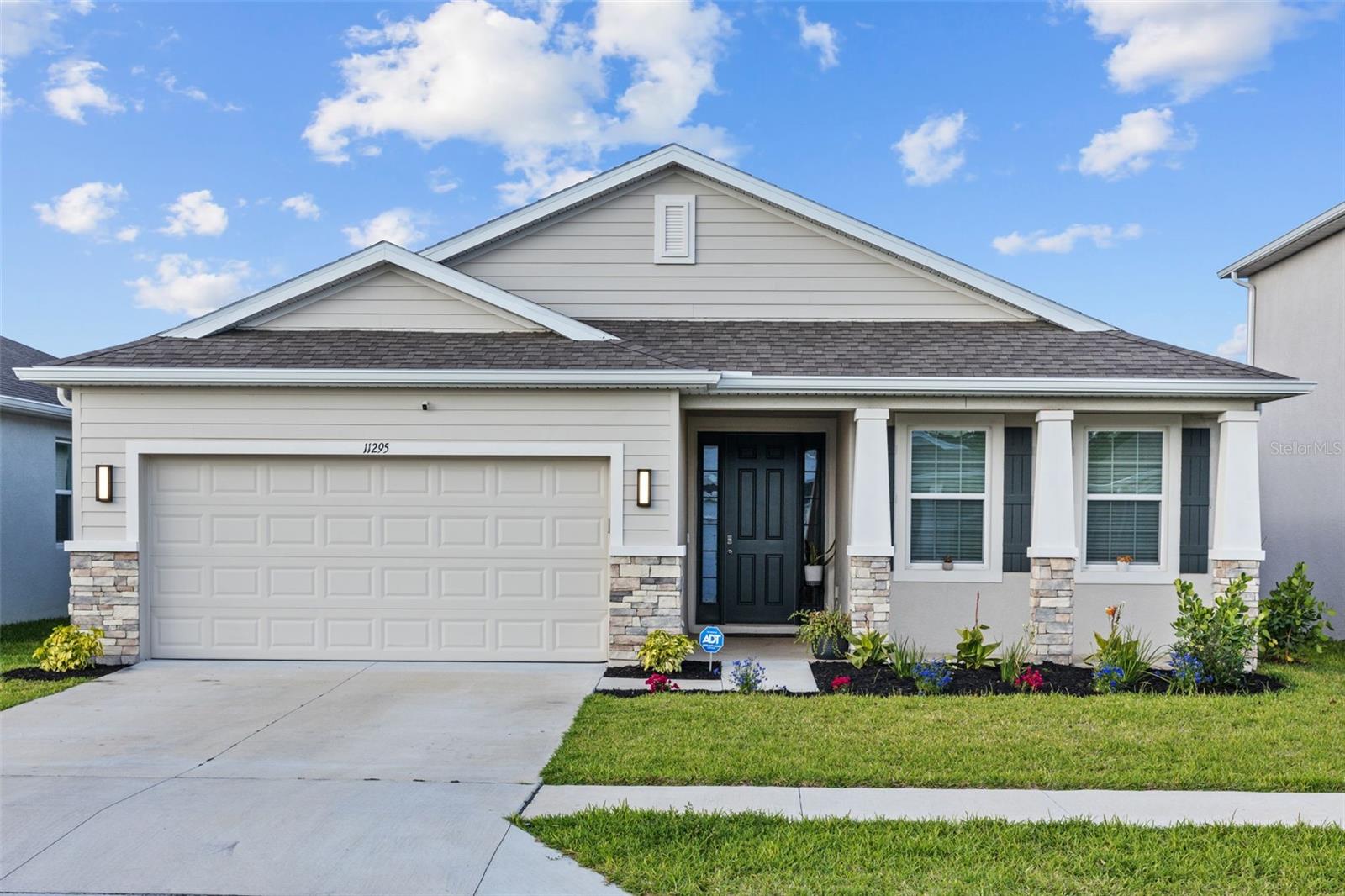 WHY WAIT for new construction when you can have it ALL—right now? SELLER OFFERING $10,000 towards BUYER'S CLOSING COSTS! Welcome to 11295 Timber Grove Ln, where luxury UPGRADES meet MOVE-IN READY perfection! This beautifully upgraded 3-bedroom, 2-bath home outshines neighboring new builds with features you simply won’t find included elsewhere. Step inside to WALL-TO-WALL tile flooring, FRESH interior paint, UPGRADED MOEN FAUCETS, a sleek UNDER-MOUNT COMPOSITE GRANITE SINK, and stylish cabinet hardware throughout. The kitchen boasts a stunning backsplash and comes fully equipped—including a REFRIGERATOR—so you can start cooking from day one! Enjoy the outdoors in your FULLY FENCED YARD, relax in the SCREENED-IN BACK PATIO, and appreciate thoughtful touches like GUTTERS, CUSTOM BLINDS on the slider, exterior lighting, and a GARAGE DOOR OPENER with PULL-DOWN ATTIC STAIRS for added storage. Every bedroom and main living space includes ceiling fans for comfort, and a chandelier in the dining area adds a touch of elegance. Other bonuses? A WATER SOFTENER SYSTEM, added privacy, and upgrades already DONE—saving you both time and money. Located just minutes from shopping, dining, medical centers, and the Gulf Coast’s famous beaches, this home offers the best of both comfort and convenience. Plus, get ready to enjoy a vibrant lifestyle with exciting upcoming community amenities, including a state-of-the-art clubhouse, resort-style pool, modern fitness center, dog park, playground, and pickleball courts—designed for fun, wellness, and connection. Don’t settle for builder-basic when you can have all the EXTRAS included. Schedule your tour today and experience the difference at Timber Grove!