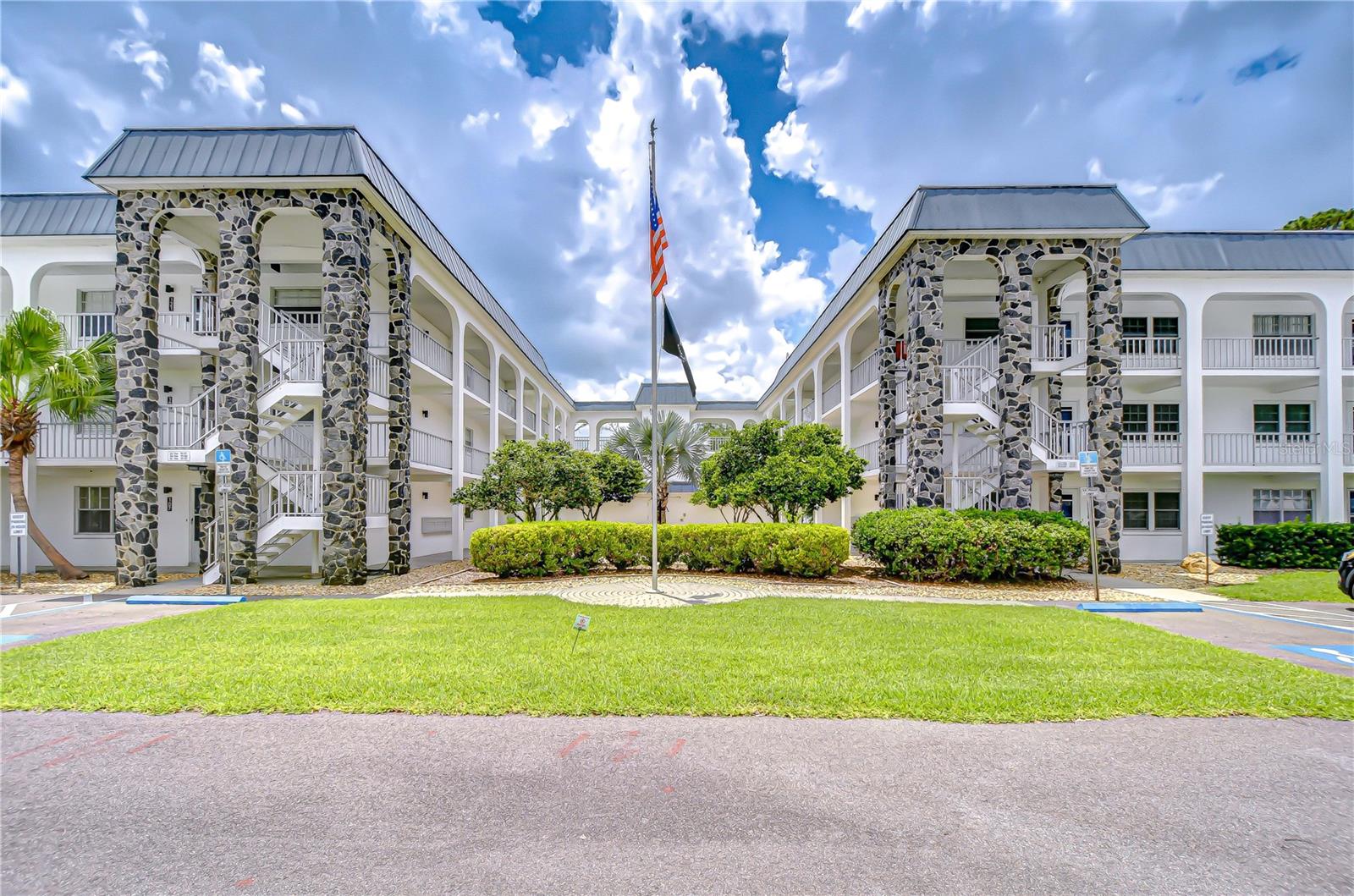 Welcome to Zephyrhills Estates, a well-maintained 55+ community offering comfort, convenience, and active living! This beautifully updated and fully furnished 1-bedroom, 1-bathroom condominium features 720 square feet of thoughtfully designed space. Built in 1975, this solid concrete building provides lasting quality and peace of mind. Inside, you’ll find a modern kitchen with white cabinetry. Updated bathroom includes a standup shower and single vanity. Newer appliances—including refrigerator, range, dishwasher, disposal, and stackable washer/dryer—plus fresh interior paint, newer A/C (2022), and hot water heater (2022). The home also includes assigned covered parking space (1 per owner) and a small storage unit. Enjoy the community amenities, including a sparkling pool, shuffleboard courts, and a community workshop. Located directly across from the Zephyrhills Golf Course, a public 18-hole course established in 1957, you’re perfectly situated for leisure and recreation. Nearby attractions include Zephyrhills Municipal Airport, Crossairocean Flight School, Skydive Zephyrhills, Krusen Park, the Skatepark, Zephyrhills Train Depot Museum, and the Museum of Military History. Plus, you’re just minutes from shopping, dining, and medical facilities. Don’t miss this opportunity to enjoy easy, stylish maintenance free living in a vibrant 55+ community!