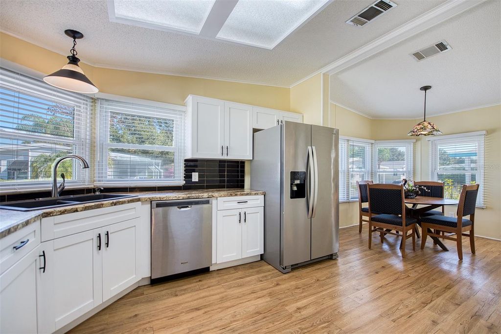 Photo of 72 Pelican Drive E, Oldsmar, FL 34677 (MLS # TB8449023)