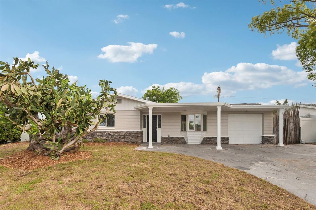 Photo of 4711 Beacon Hill Drive, New Port Richey, FL 34652 (MLS # TB8495967)