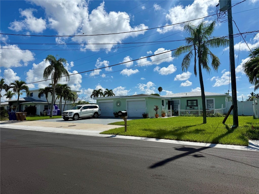 Photo of 722 Pruitt Drive, Madeira Beach, FL 33708 (MLS # TB8543910)