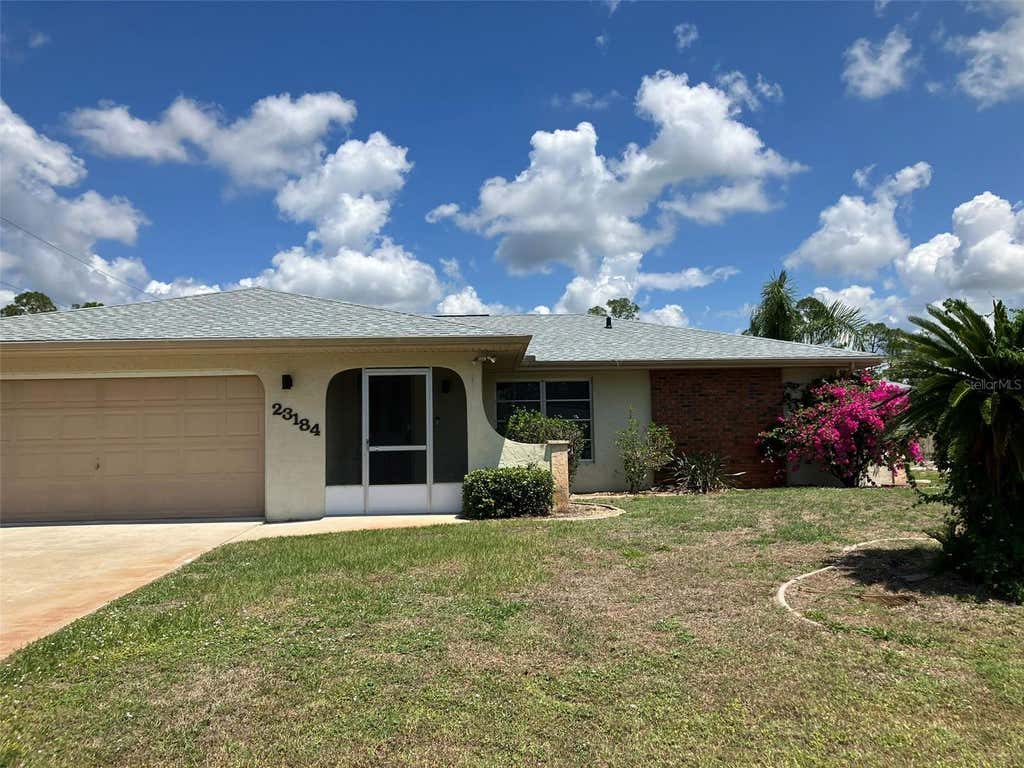 Photo of 23184 Glory Avenue, Port Charlotte, FL 33952 (MLS # C7529117)