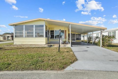 Photo of 6721 Canterbury Drive NE, Winter Haven, FL 33881 (MLS # S5140139)