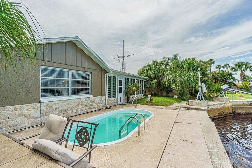 Photo of 6613 Harbor Drive, Hudson, FL 34667 (MLS # TB8425052)