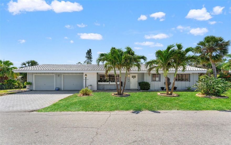 One or more photo(s) has been virtually staged. PRICE IMPROVEMENT!! WATERFRONT GEM ON LONGBOAT KEY – Priced UNDER $1M & Renovation Loan Eligible! This is your chance to own a waterfront home on Longboat Key for under $1 million! Opportunities like this are rare, and this property is priced to sell fast. Featuring 2 bedrooms, 2 bathrooms, and a 1-car garage, this home also includes a separate 1-bedroom, 1-bathroom GARAGE APARTMENT with its own entrance—perfect for SHORT TERM RENTALS or guest accommodations. Sitting directly on a CANAL with room to dock a boat, this home is a dream for boaters and beach lovers alike. The 120 feet of reinforced seawall ensures lasting waterfront stability. Enjoy DEEDED BEACH ACCESS, just a short stroll away, where you can witness the magic of turtle nesting season. Walk to dog-friendly Durante Park, the scenic shores of Sarasota Bay, and some of Longboat Key’s most popular restaurants, including Lo’Key and Harry’s Continental Kitchen. Cannon’s Marina is nearby for all your boating needs, and the trolley provides easy access to Anna Maria Island. The home boasts a 2024 AC and a 5-year-old tile roof, giving you peace of mind on major updates. The private outdoor space is perfect for soaking up Florida’s year-round sunshine. Renovation Loan Eligible – Plus an Incredible Build Opportunity! This property qualifies for a renovation loan, allowing you to finance both the purchase and renovations—an incredible opportunity to customize your dream home while keeping costs manageable. Looking for even more space? The vacant lot next door is also for sale, making this a rare chance to tear down and build a custom waterfront compound. Waterfront. Deeded beach access. Room for a boat. Rental potential. And all for UNDER $1 MILLION! This is an **unbeatable opportunity** in one of the most desirable locations on the Gulf Coast. Don’t miss out—schedule your showing today!