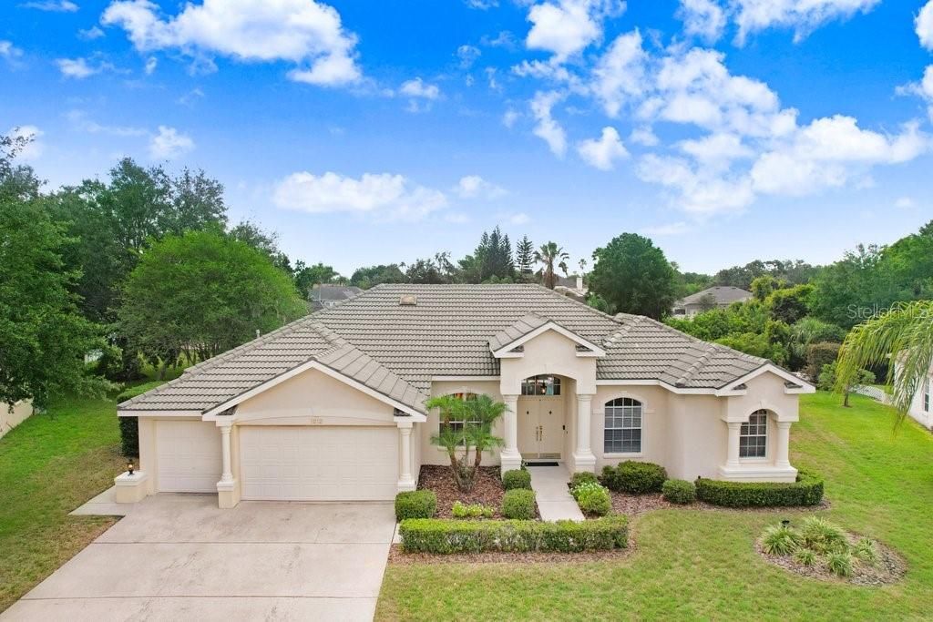 Photo of 1212 Baycove Lane, Lutz, FL 33549 (MLS # TB8388702)
