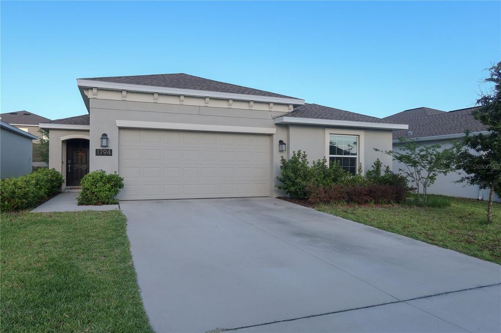 Photo of 1794 Perch Hammock Loop, Groveland, FL 34736 (MLS # G5111782)