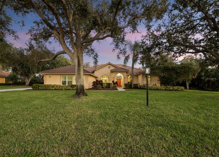 A peaceful retreat with an estate feel and exceptional privacy on a half-acre preserve lot in the gated Serenoa golf-course community. This meticulously maintained 4-bedroom, 3-bath, 3 car garage and pool home sits on an oversized homesite with no rear neighbor and only one neighbor to the side, mature oaks canopy the streets, a meandering side yard creek, and frequent deer, bunnies, and gracious crane visits create true country serenity. Inside, a bright split-plan layout provides privacy for the primary suite, while generous secondary bedrooms and spacious room sizes make everyday living easy. The great room with volume ceilings is built for entertaining and flows to a large lanai with pavered pool area and outdoor bar seating—perfect for gatherings. A formal dining room and living room complement the open kitchen/family room (with fireplace), and the side-entry garage enhances the estate look.   ***Recent updates include: a new pool cage, pool pump, newer impact windows and sliders, and electric fence.***   Serenoa offers optional membership at its golf club, uniquely designed custom homes on large lots, and beautiful oak-lined streets. You’re minutes to I-75 and convenient to all Sarasota amenities—an active downtown, cultural venues, and Siesta Key, Lido, and Longboat Key for beach and water sports. Zoned for Lakeview Elementary, Skye Ranch School, Sarasota Middle, and Riverview High, with Twin Lakes Park a short ride away. This home is ideal for year-round living, or it can provide the ultimate snowbird lifestyle. Move-in ready, private, and perfectly positioned to enjoy the best of Sarasota.