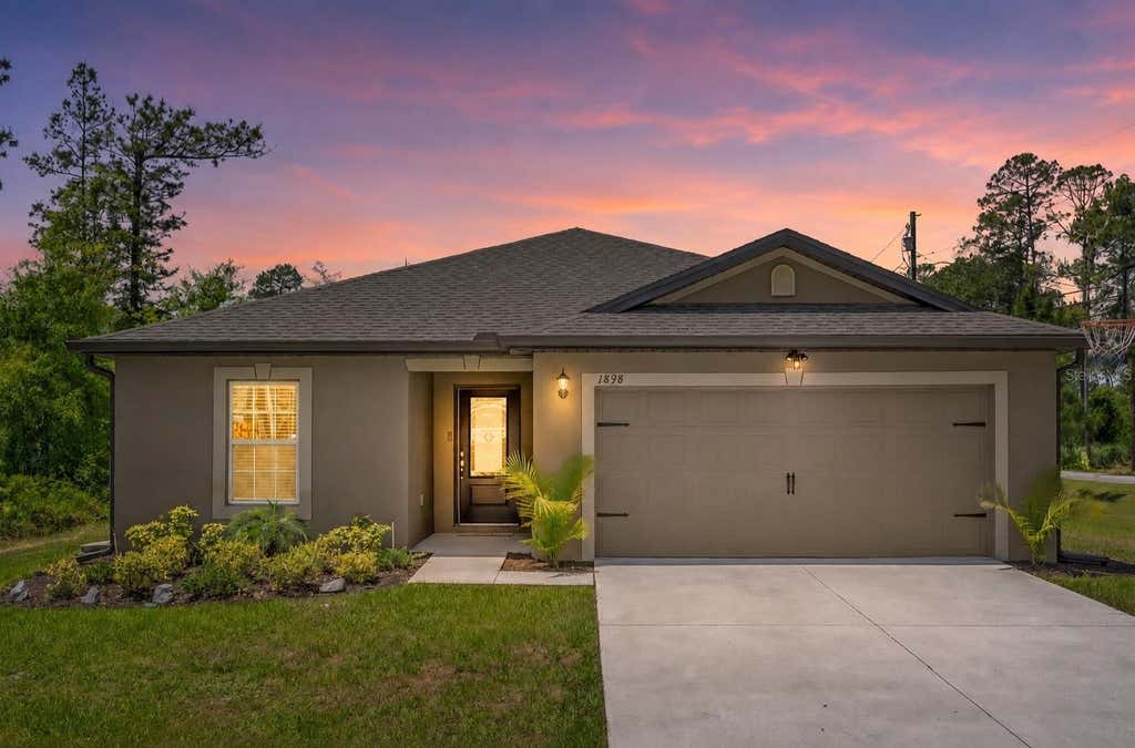 Photo of 1898 9th Avenue, Deland, FL 32724 (MLS # O6431211)