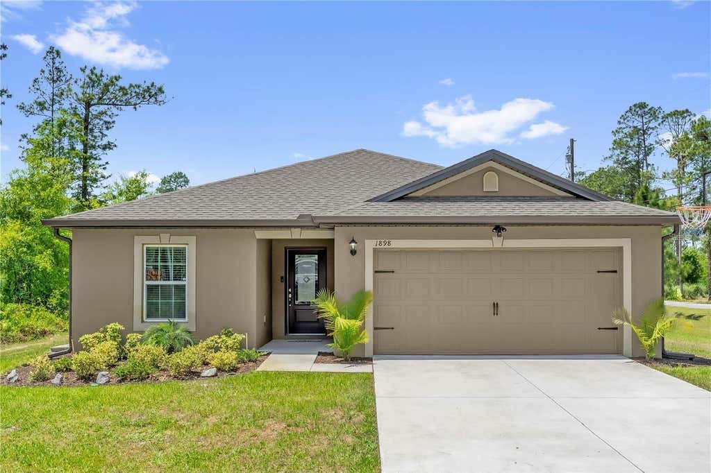 Photo of 1898 9th Avenue, Deland, FL 32724 (MLS # O6431211)