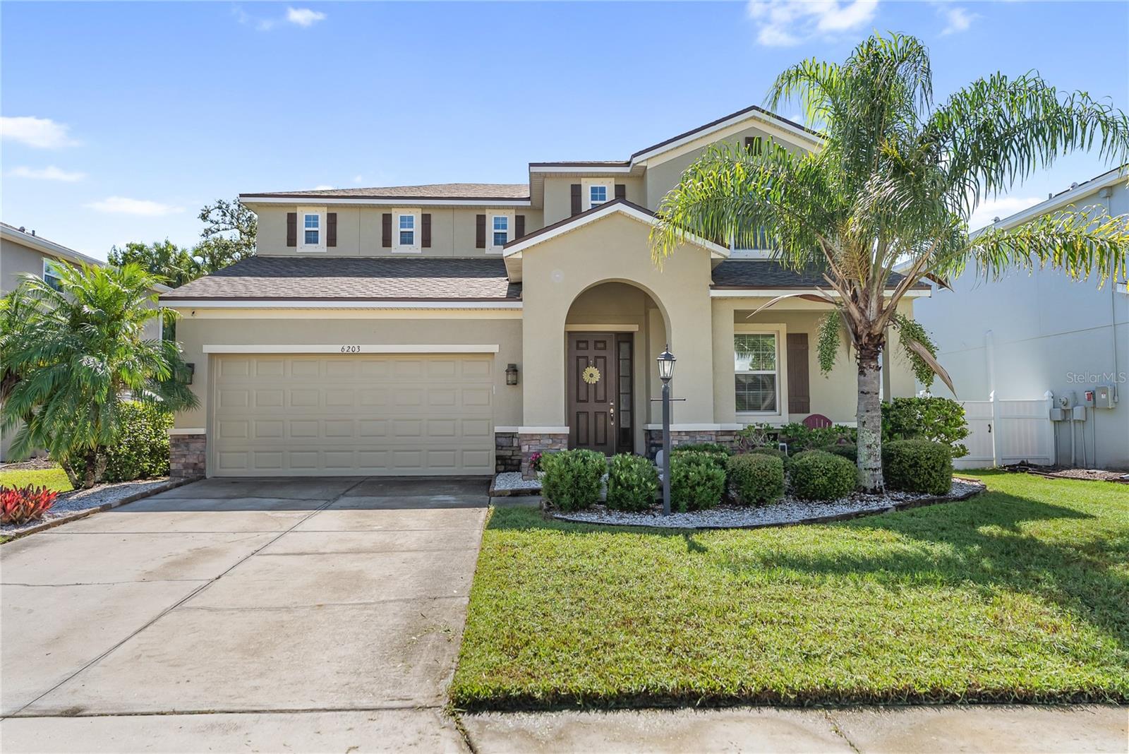 **This property qualifies for a 1% lender credit towards rate buydown or closing costs through preferred lender.**
You've just discovered your dream home! Welcome to this absolutely stunning perfectly nestled in the highly sought-after Prospect Point neighborhood! This is a RARE, MOVE-IN-READY HEATED POOL HOME that offers the ultimate Florida lifestyle with the added bonuses of NO CDD fees and LOW HOA fees! What more could you possibly ask for?!
Built in 2015, this meticulously maintained 2,759-square-foot residence boasts an incredible 4 bedrooms PLUS a dedicated office and 3.5 baths! From the moment you step inside, you'll be captivated by the soaring ceilings, expansive windows, and an abundance of natural light that beautifully illuminate every exquisite detail of this gorgeous property.
The heart of this home is truly the bright and airy chef's kitchen, brimming with charm and style! It features an expansive granite island with a breakfast bar, a convenient walk-in pantry, sleek stainless steel appliances, premium 42" staggered cabinets, and a decorative tile backsplash – perfect for culinary adventures! The open flow from the kitchen into the spacious great room, complete with a tray ceiling, creates an ideal setting for entertaining and everyday living.
Step outside through the beautiful sliding glass doors from the dining room and prepare to be amazed by your private oasis! The elegant travertine pool deck stays wonderfully cool, even under the glorious Florida sun. You'll spend countless hours relaxing under sunny blue skies on the outside patio or unwinding in the shade of the undercover screened lanai. These incredible features are just a taste of what makes the Florida lifestyle so truly wonderful! Plus, your furry members will love the freedom of the fenced backyard!
Pride of ownership shines throughout this remarkable property, evident in every detail. Even better, significant upgrades have already been taken care of for you, including a new roof (July 2025), new pool pump (2025), rescreened lanai (2025), new garbage disposal (2025), new garage spring (2024), new garage door keypad (2025), new smoke alarms (2025), new exterior paint (2023), and new interior paint (2025)! For ultimate comfort and peace of mind, the HVAC system was just serviced and cleaned this month!
The luxurious master bedroom is conveniently located on the first floor, offering a private sanctuary. Its en-suite bath is a spa-like retreat, boasting dual sinks, a large soaking tub with a separate, fully tiled shower stall, and an impressive walk-in closet. Plus, discover a second primary bedroom upstairs, providing incredible flexibility and space for guests or multi-generational living!
And there's more! This home also features an oversized 2-car garage with convenient upper storage shelves and a workbench, providing ample space for all your needs. The office furniture and shelving will also convey with the home, making your move even easier!
Located just minutes from the University Town Center Mall, The Sarasota Performing Arts Center, The Sarasota Opera House, Van Wezel Performing Arts Hall, and the stunning gulf beaches of Siesta Key, Longboat Key, Lido Key, and Anna Maria Island, along with numerous parks and trails, this home offers the perfect blend of convenience and natural beauty.
This is truly a MUST-SEE HOME! Easy to show, so don't delay – schedule your private showing today and prepare to fall in love!