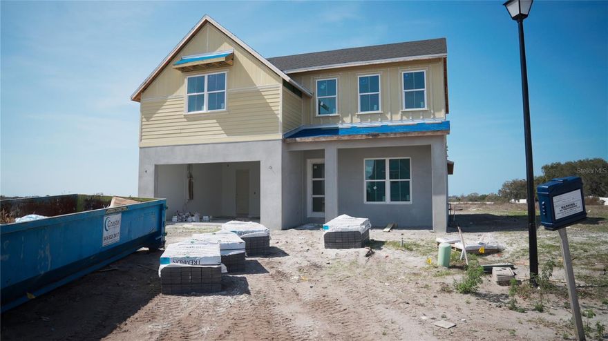 Under Construction. Under Construction with anticipated completion date of April 2026. Experience elevated living in the Grand Bay Haven at Gracewater, one of Sarasota’s most exciting new resort-style communities, with a projected completion date of mid-to-late April 2026. This stunning two-story residence offers over 3,200 square feet of thoughtfully designed living space, featuring 4 bedrooms, 3.5 baths, a private study, and an expansive loft/bonus room that provides flexibility for a media space, playroom, or additional guest retreat. Designed for both everyday comfort and effortless entertaining, the open-concept great room flows seamlessly into a chef-inspired kitchen appointed with quartz countertops, natural gas appliances, impact-rated windows and sliders, 8-foot interior doors, and elevated coastal finishes that create a bright, sophisticated ambiance throughout. The spacious primary suite serves as a private sanctuary with a spa-like bath and generous proportions, while three additional bedrooms and two full baths are ideally situated upstairs around the versatile loft area. Step outside to your covered lanai and enjoy your own private inground pool, creating the perfect setting for relaxing afternoons, weekend gatherings, and year-round Florida outdoor living. Located within the gated Gracewater community, residents enjoy a true lifestyle experience with a resort-style zero-entry pool and cabanas, elegant clubhouse, state-of-the-art fitness center, pickleball courts, dedicated dog park, and an on-site lifestyle manager coordinating social events and activities. Just minutes from downtown Sarasota’s dining, arts, and entertainment scene, world-renowned Gulf beaches, SRQ Airport, and convenient access to I-75, this exceptional new construction opportunity blends luxury, comfort, and location—allowing you to secure your place now and move into your brand-new Grand Bay Haven just in time to enjoy spring 2026 in style. (Builder has chosen finishes for the kitchen and bathrooms but different selections can be made if buyer goes under contract prior to installation)